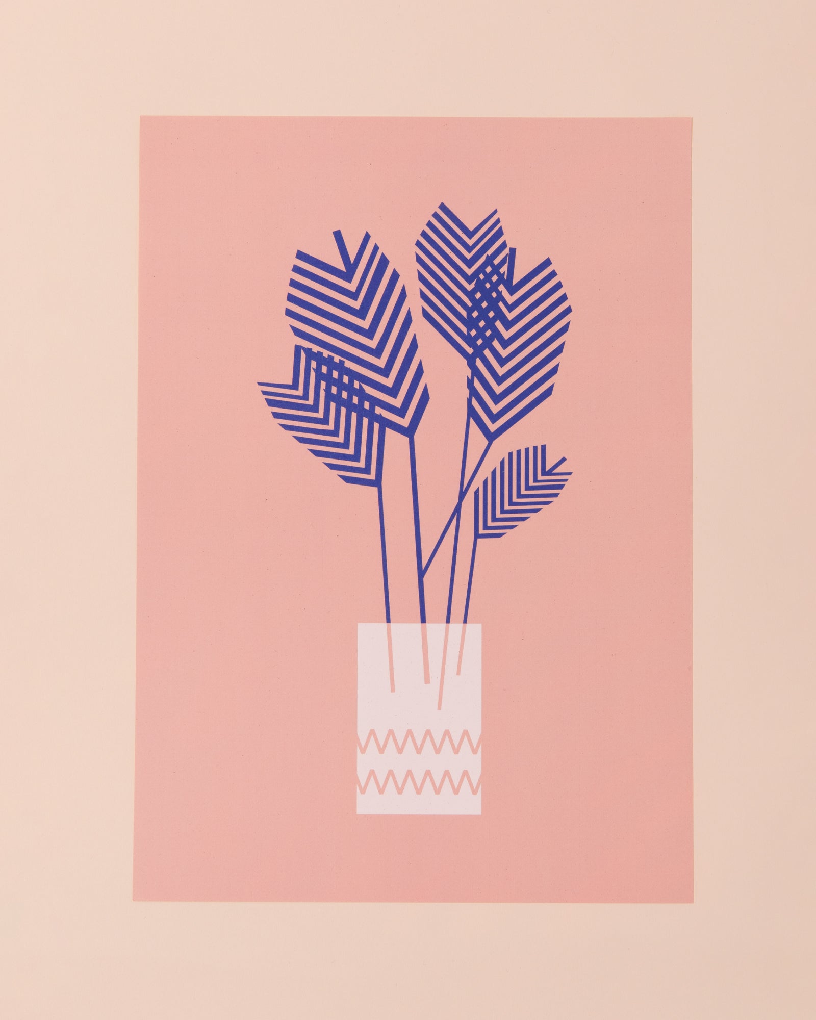 Colourful art print of a blue palm plant on a pink background