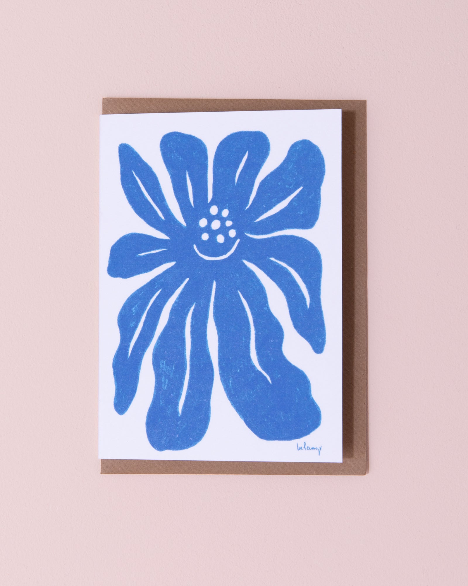 Evermade illustrated greetings card with a brown kraft envelope. Blue flower on a white background.