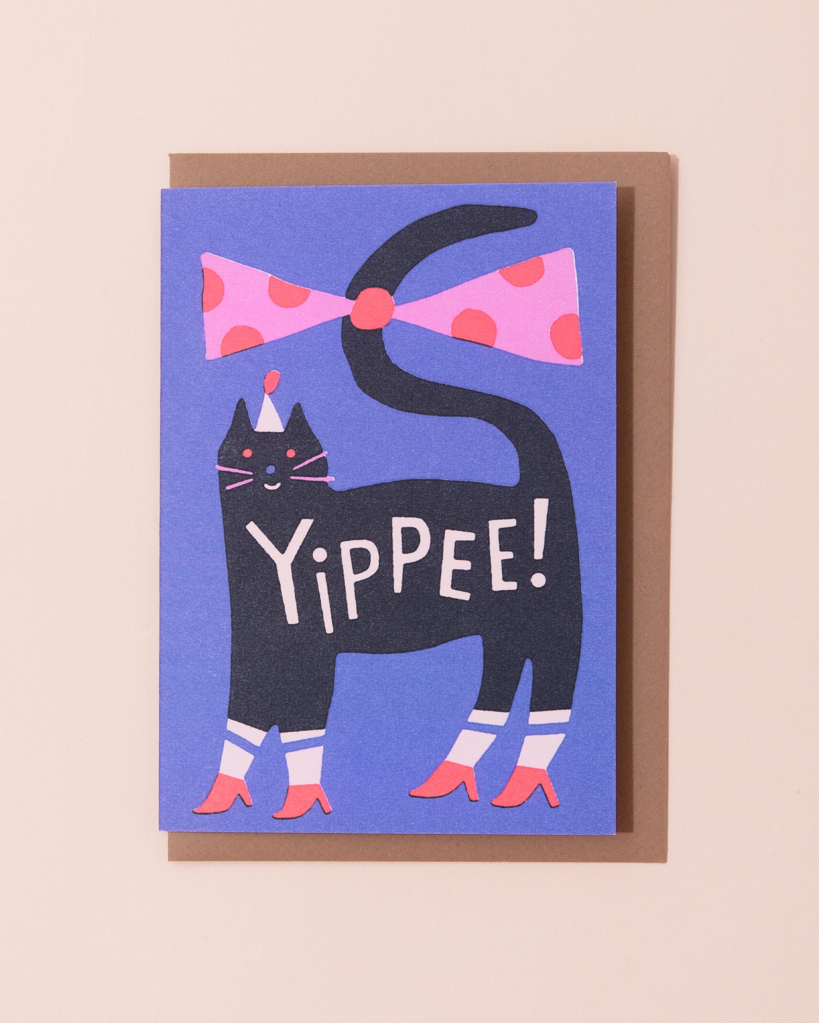 Greetings card with illustration of a black cat and the word Yippee!