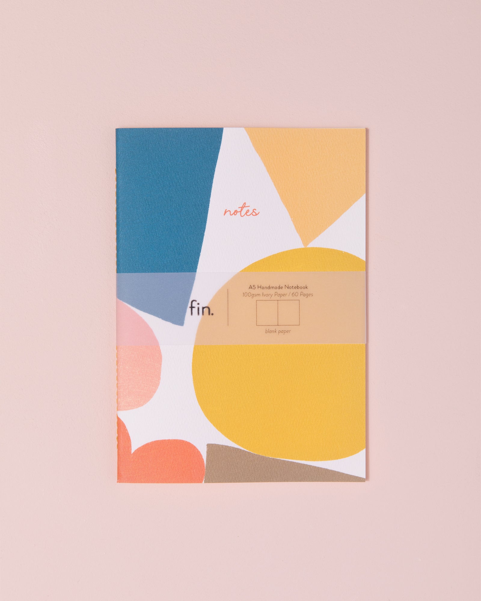 Abstract shapes notebook in red, blue, pink and yellow
