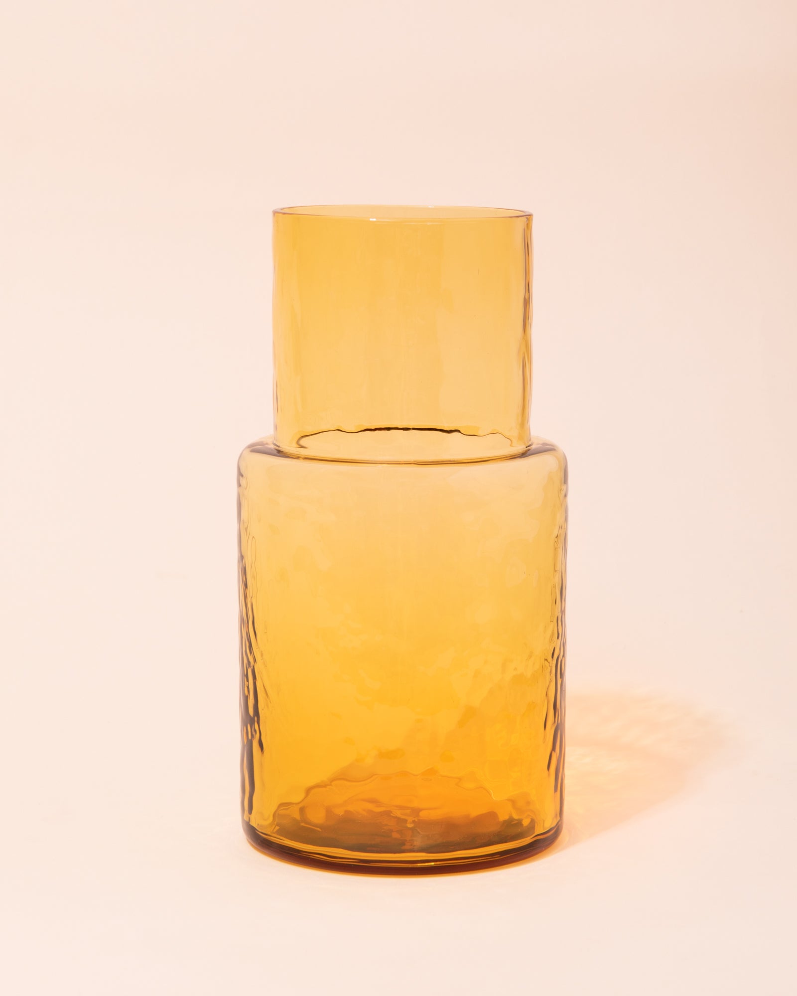 Yellow textured glass carafe by HKLIVING