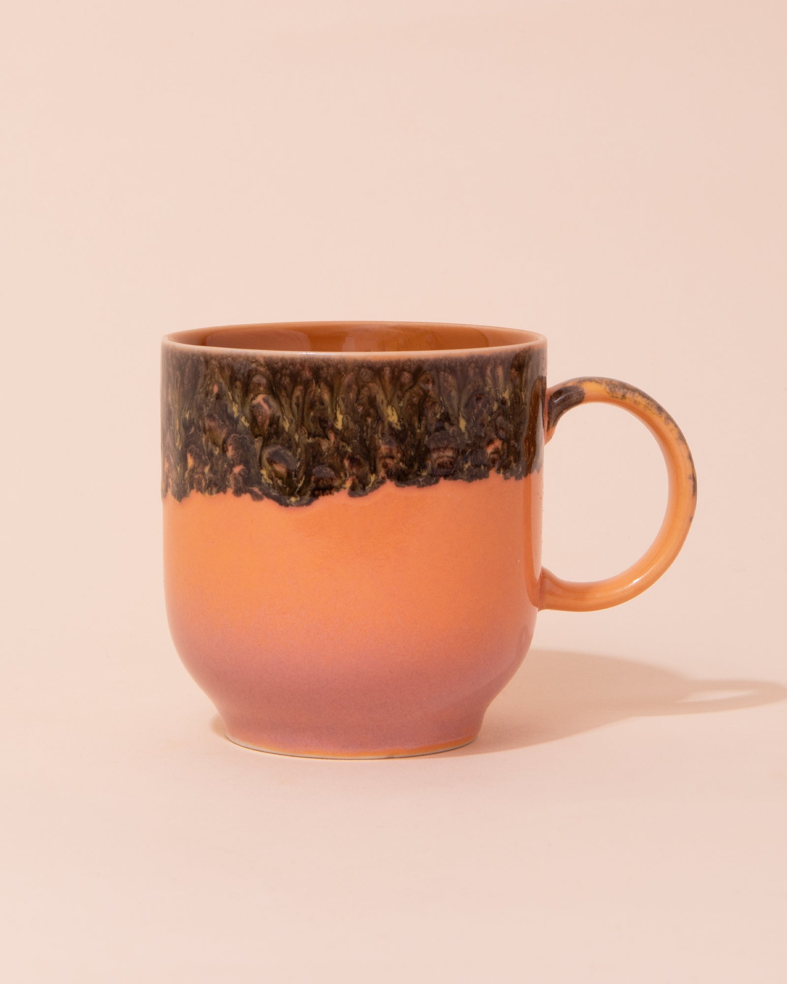 Pink and yellow ceramic coffee mug by HKLIVING