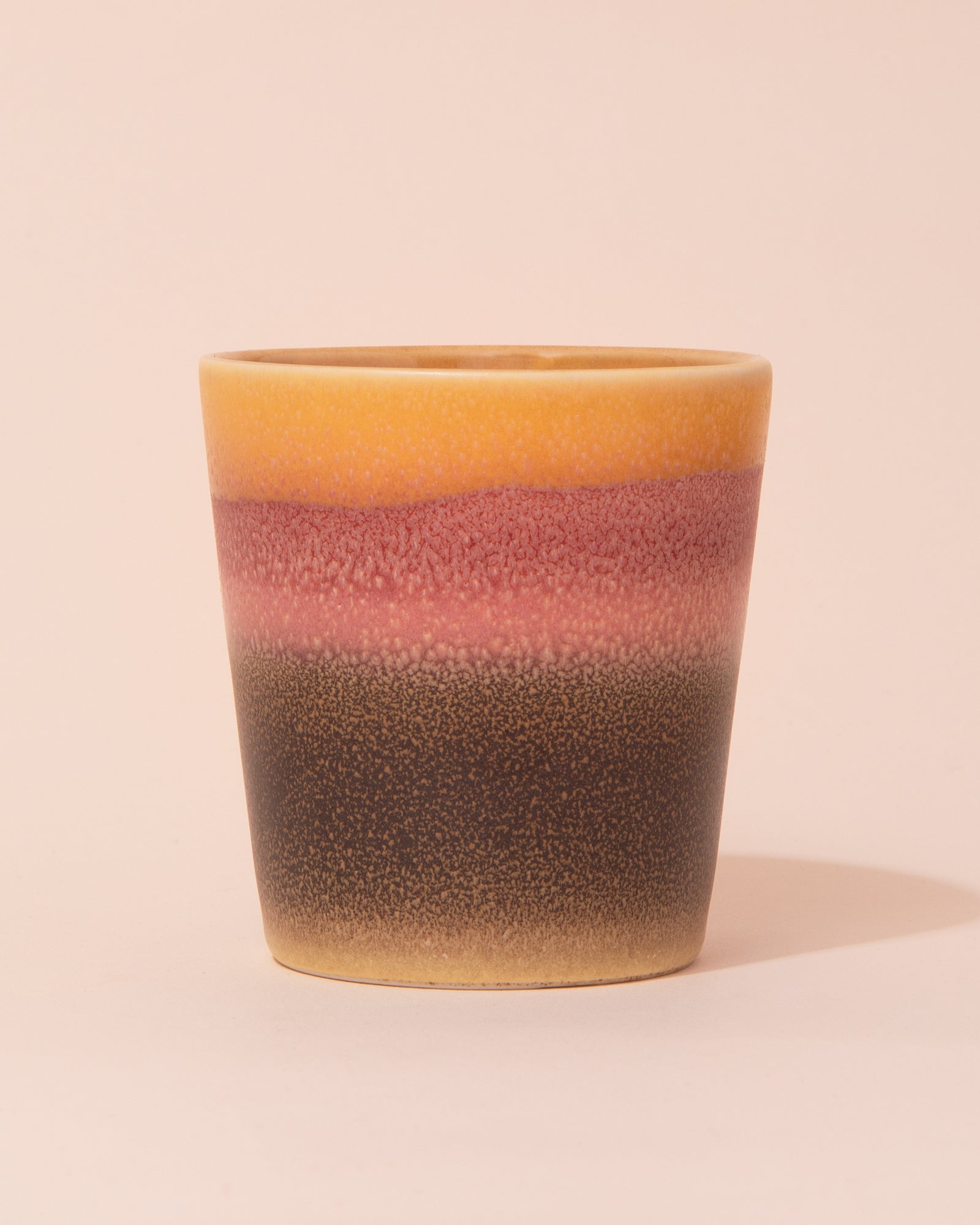 Pink, yellow and black ceramic coffee cup by HKLIVING