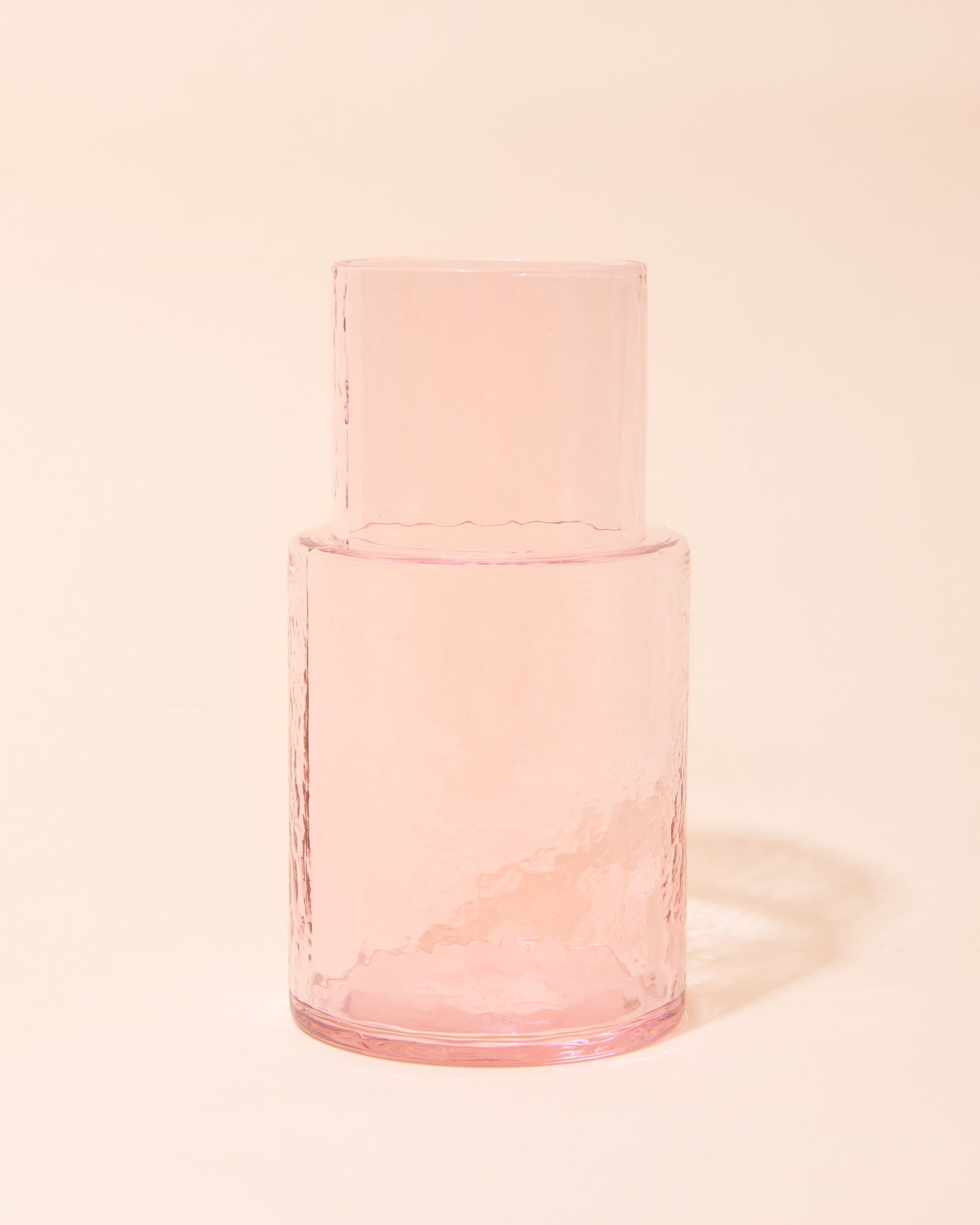 Pink textured glass carafe by HKLIVING