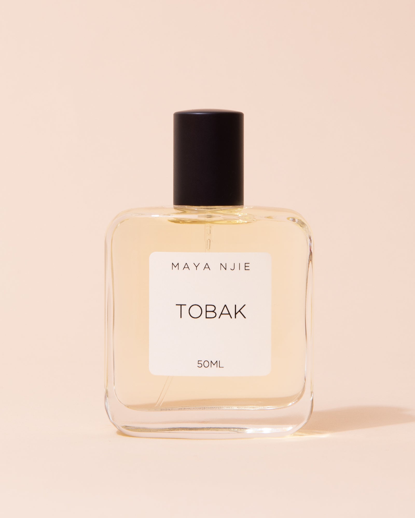 Glass perfume bottle of Maya Njie Tobak fragrance