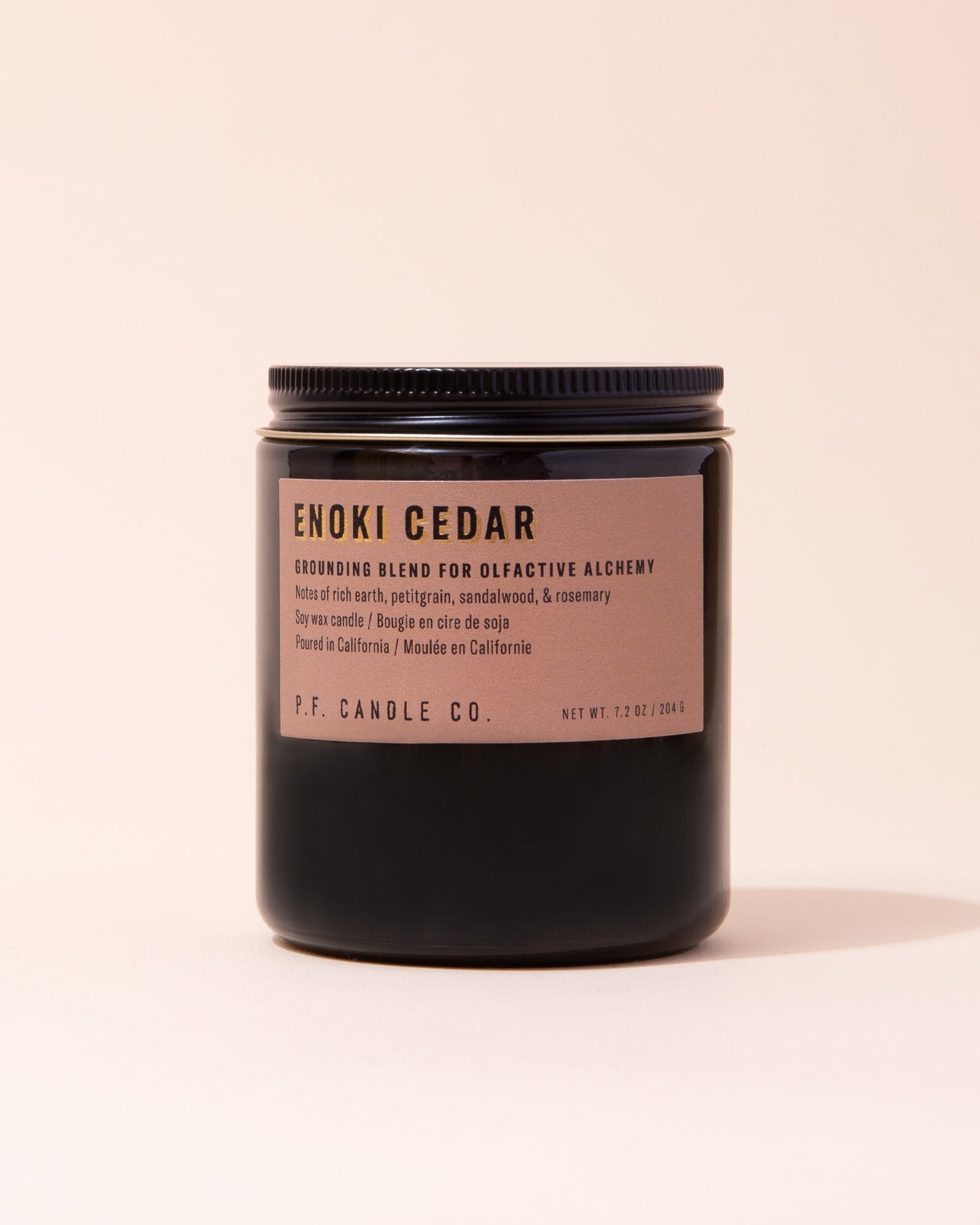 Black jar of Enoki Cedar candle by P.F Candle