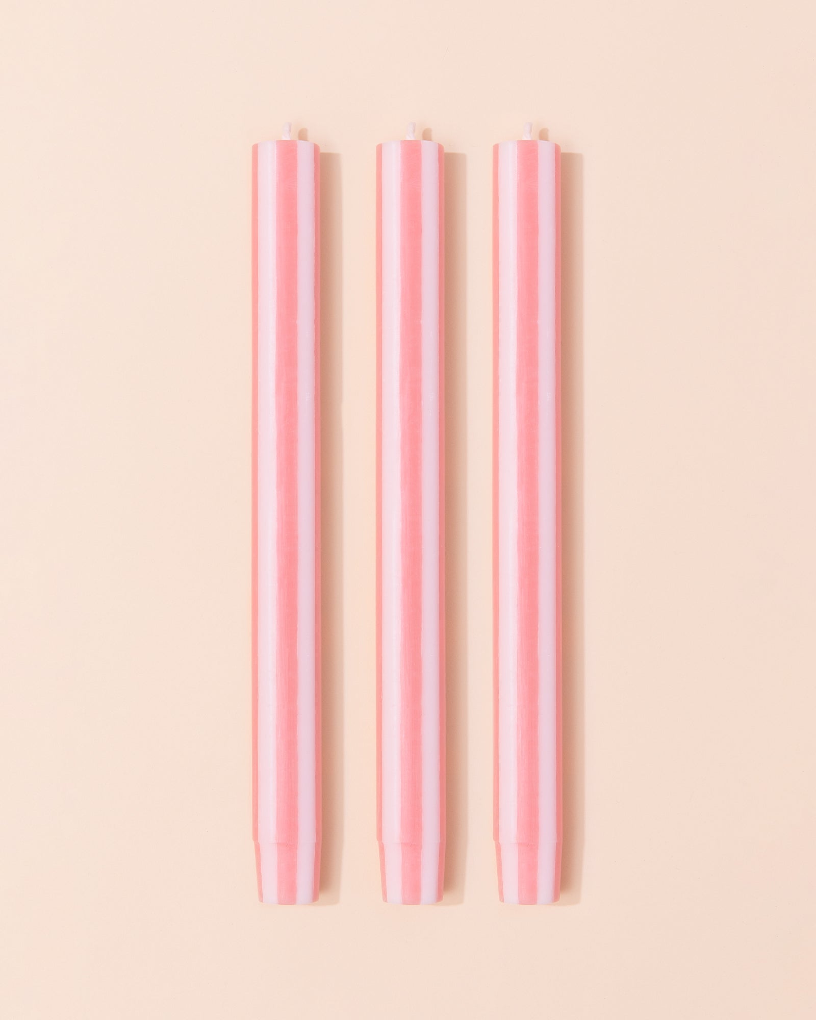 Pink and white stripe dinner candle