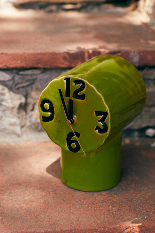 Green ceramic 70s style clock by HKLIVING