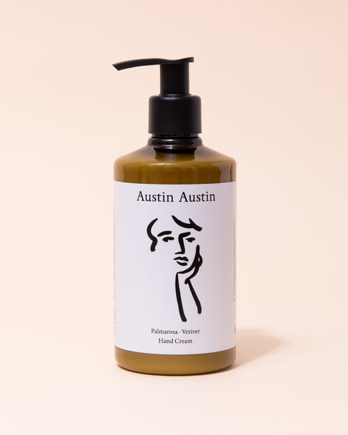 Austin Austin organic palmarosa and vetiver hand cream in black, white and amber bottle