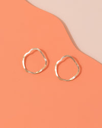 Brass wavy earrings by Custom Made