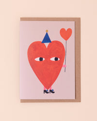 Colourful greetings card with an illustration of a heart holding a balloon