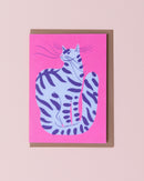 Evermade illustrated greetings card with a brown kraft envelope. Purple striped cat on a bright pink background.