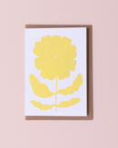 Evermade illustrated greetings card with a brown kraft envelope. Yellow flower on a white background.