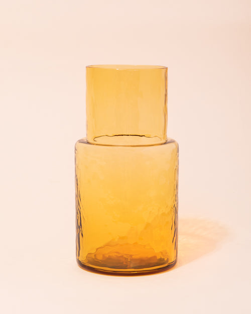 Yellow textured glass carafe by HKLIVING