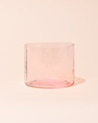 Pink textured drinking glass by HKLIVING