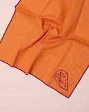 Orange and burgundy embroidered linen napkins with cheese design