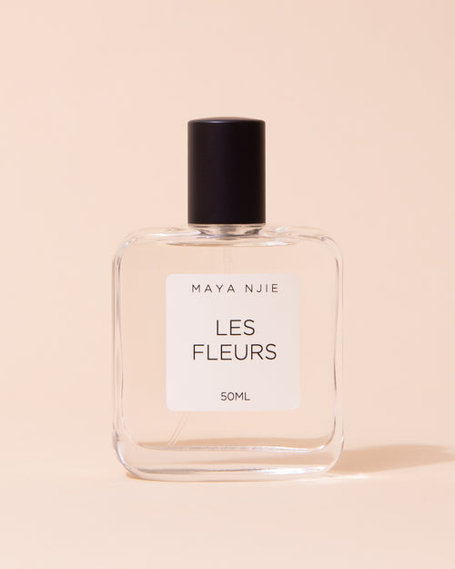 Glass perfume bottle of Maya Njie Les Fleurs fragrance