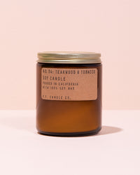 Teakwood & Tobacco P.F Candle Co. soy candle in amber glass jar