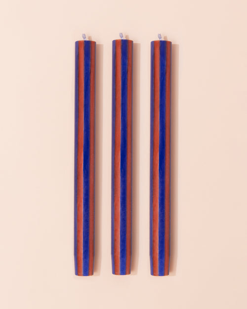 Maroon and red stripe dinner candle